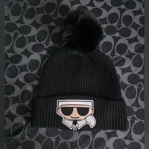 NWT Karl Lagerfeld Black Beanie Hat with Cartoon Patch And Faux Fur Pom
